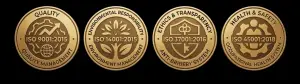 Four gold circular medals on a black background, each showing an ISO standard: ISO 9001:2015 Quality Management, ISO 14001:2015 Environmental Management, ISO 37001:2016 Anti-Bribery System, and ISO 45001:2018 Occupational Health & Safety; all with decorative emblems and text around the rim